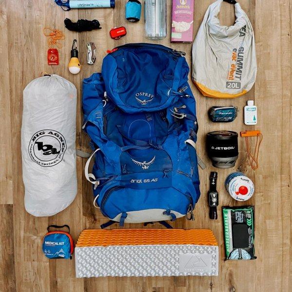 Organized backpacking gear layout