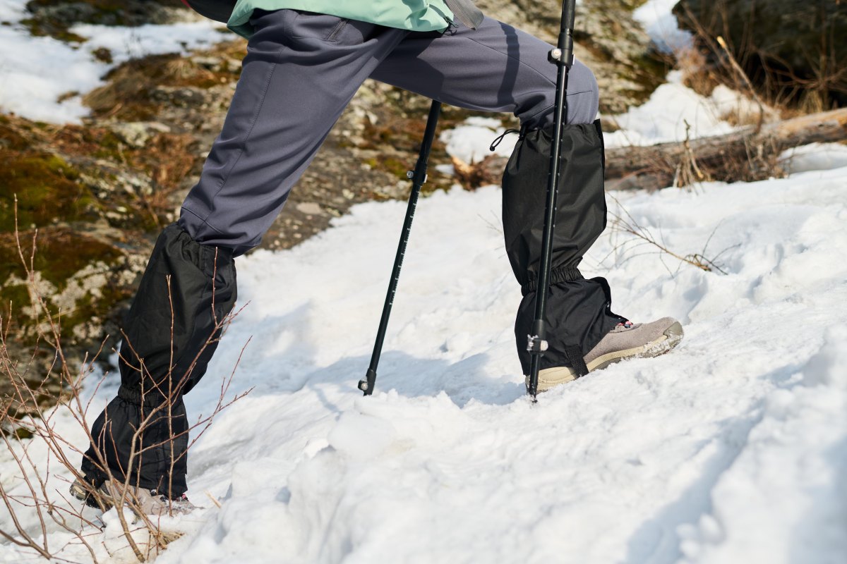 Winter hiking pants on snowy trail