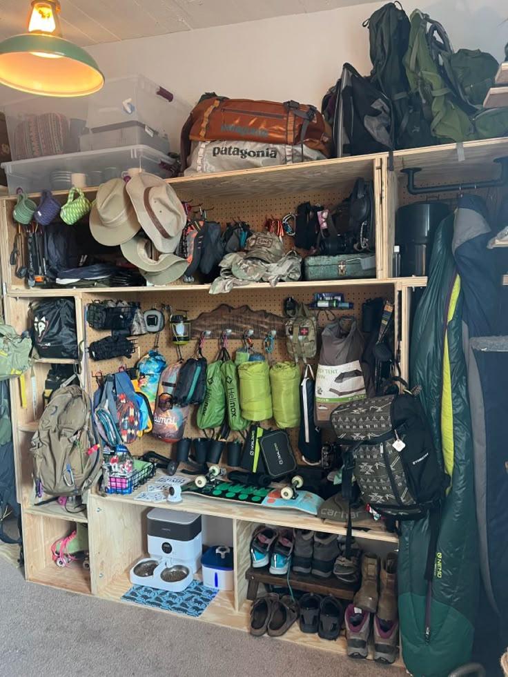 Hiking gear storage shelves with outdoor equipment