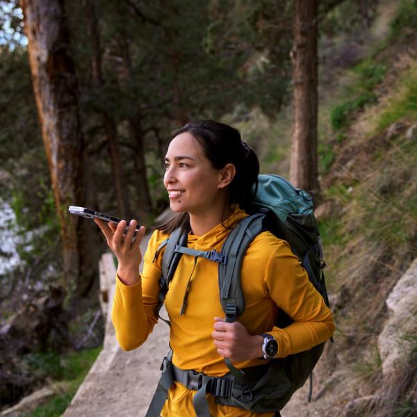 Hiker using satellite communication device