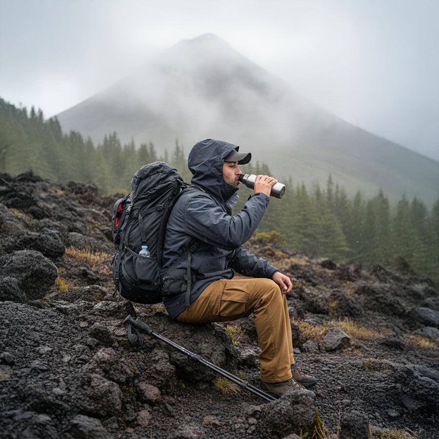 Insulated bottle on rainy hike