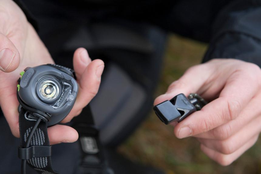 Headlamp whistle and signal gear