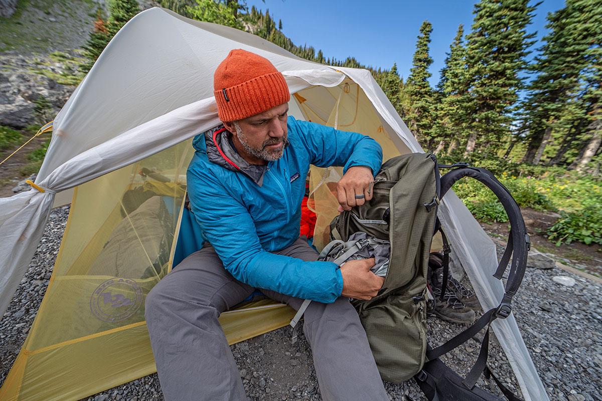 Hiker packing backpacking gear
