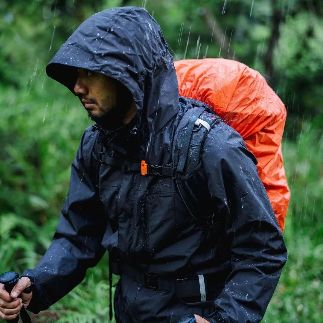 Backpack with rain cover in forest