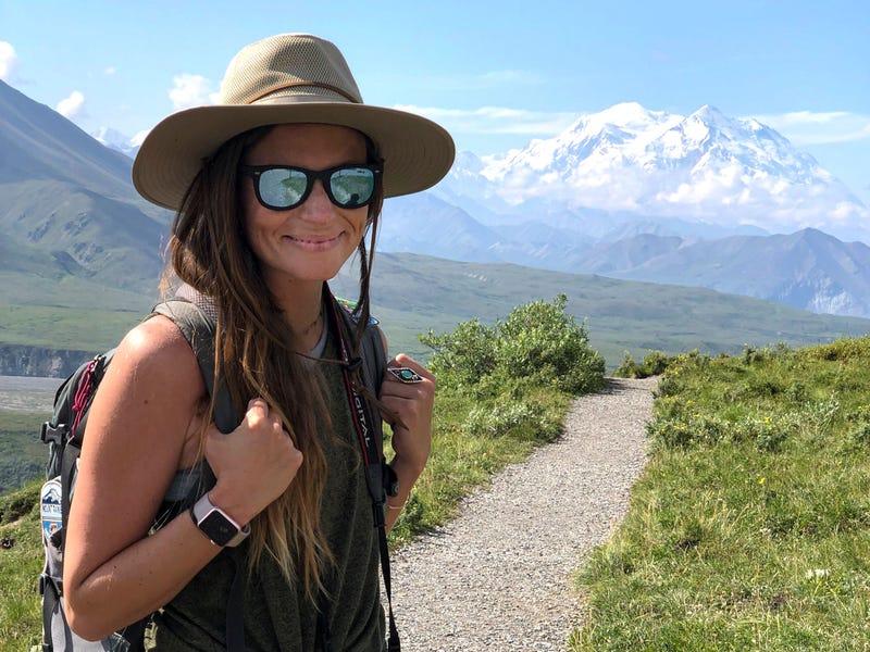 Hiker wearing sun protection gear