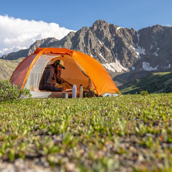 Tent pitched in mountain wilderness