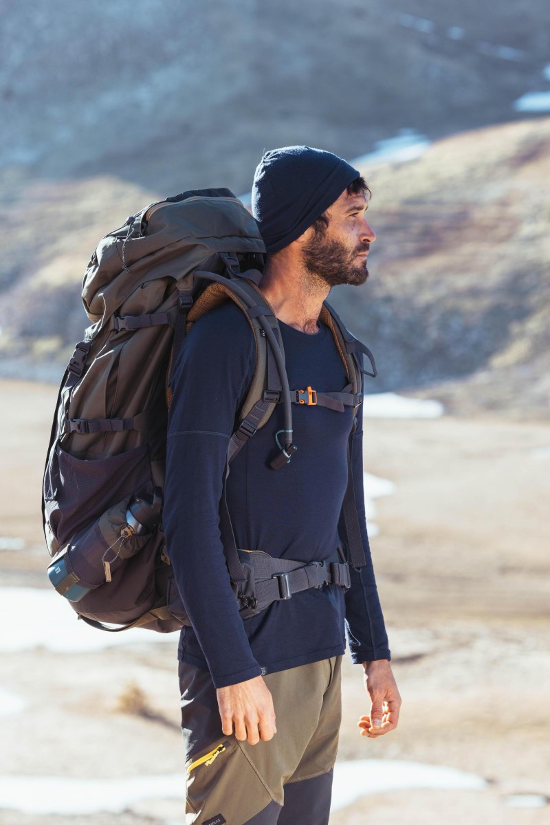 Hiker wearing practical quick dry outdoor clothing
