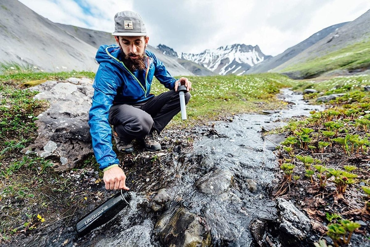 Portable water filter at stream