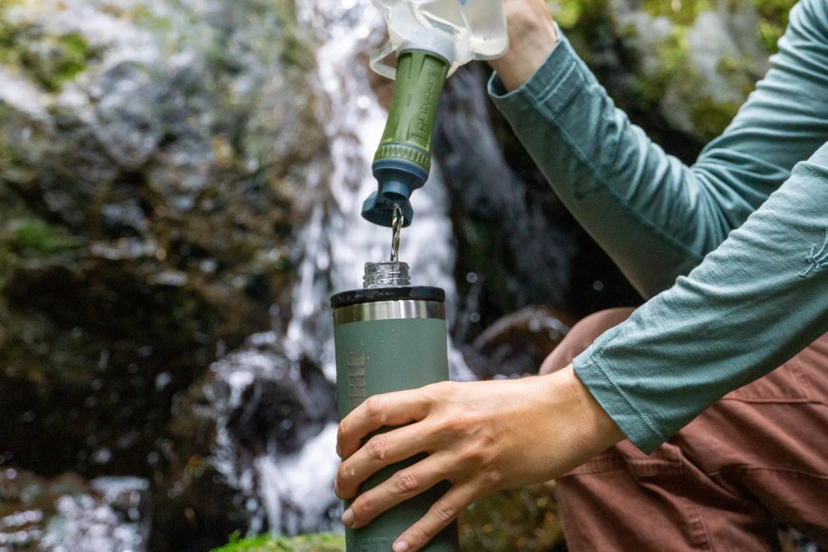 Portable hiking water filter and bottle