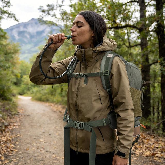 Hiker drinking trail water