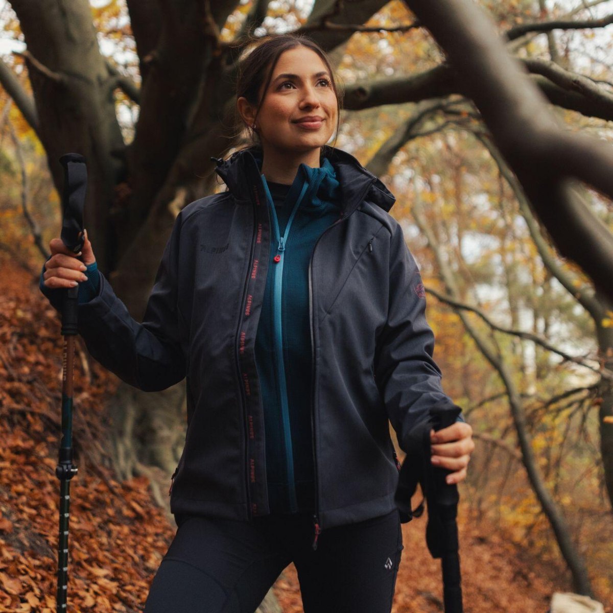 Woman wearing softshell hiking jacket